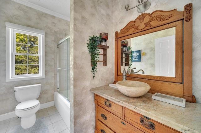 15 Huntington Ridge Rd, Wallingford, CT 06492 - bathroom with vanity, toilet, tile patterned floors, shower / bath combination with glass door, and crown molding