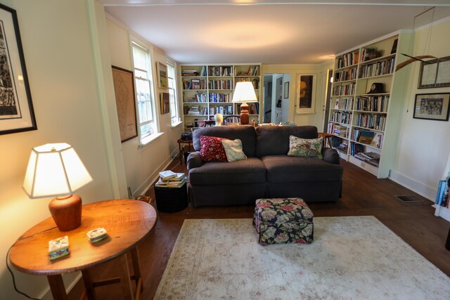 living room featuring dark hardwood / wood-style floors