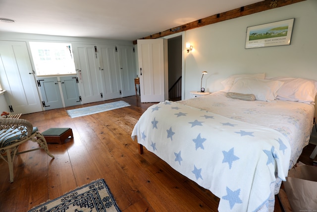 bedroom featuring wood-type flooring