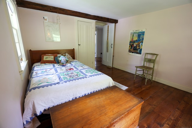 bedroom featuring dark hardwood / wood-style floors