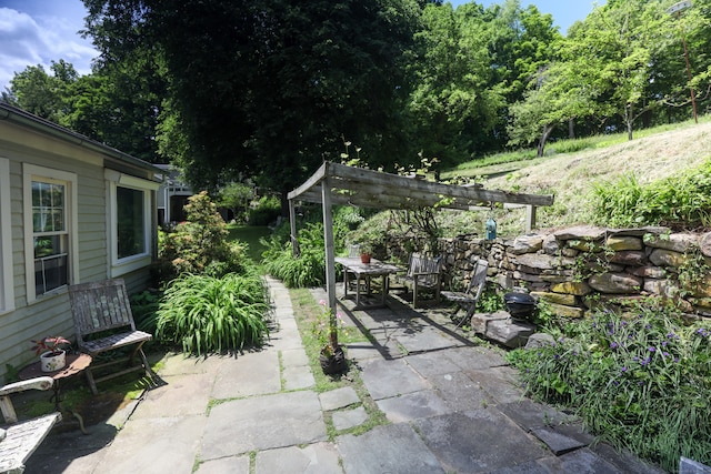 view of patio featuring a pergola