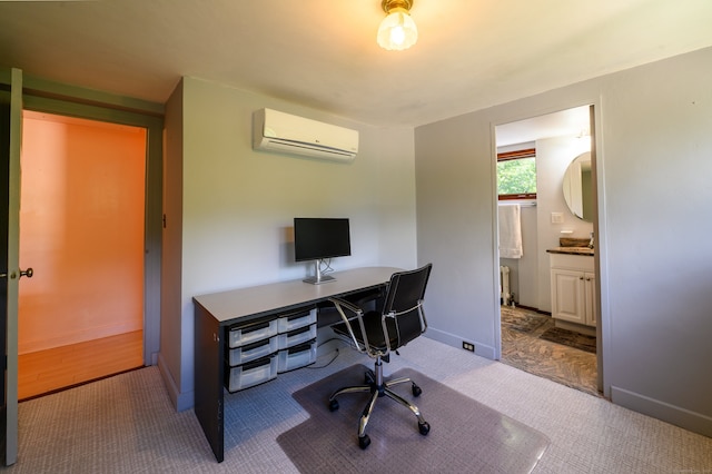 office area featuring hardwood / wood-style floors and a wall unit AC