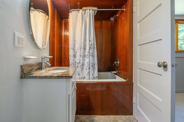 bathroom featuring vanity and shower / tub combo