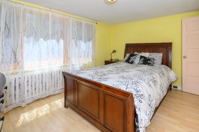 bedroom featuring light hardwood / wood-style floors