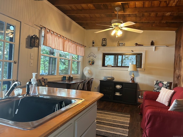 kitchen featuring wooden ceiling, a wealth of natural light, sink, and dark wood-type flooring