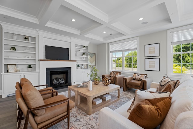 living room with beam ceiling, coffered ceiling, a wealth of natural light, and dark wood-type flooring