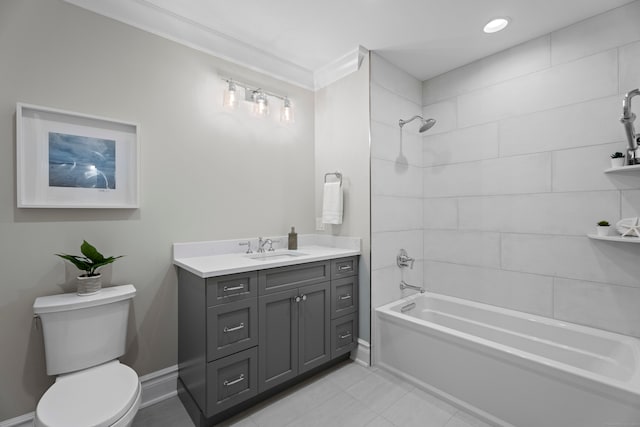 full bathroom with tiled shower / bath, toilet, tile patterned flooring, vanity, and ornamental molding