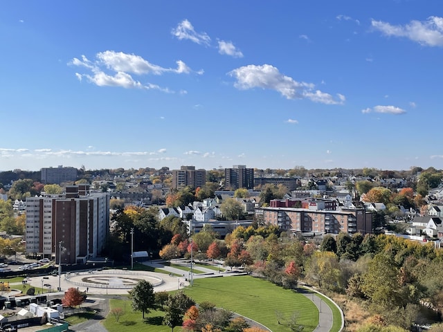 birds eye view of property featuring a city view