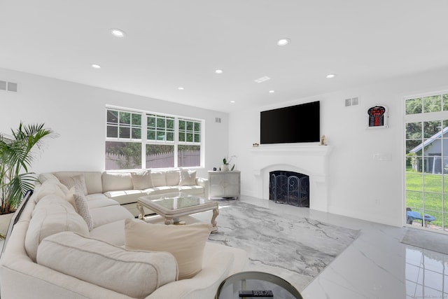 living room featuring a healthy amount of sunlight