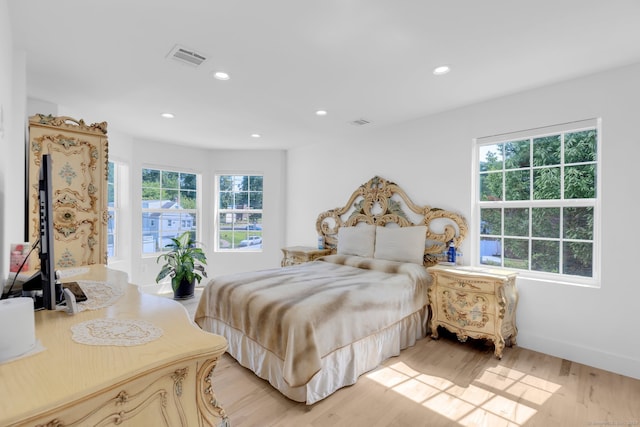 bedroom featuring light hardwood / wood-style flooring