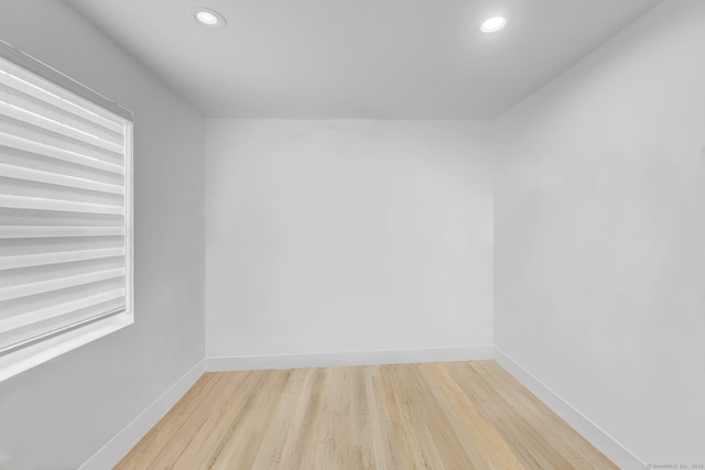 spare room featuring light hardwood / wood-style flooring