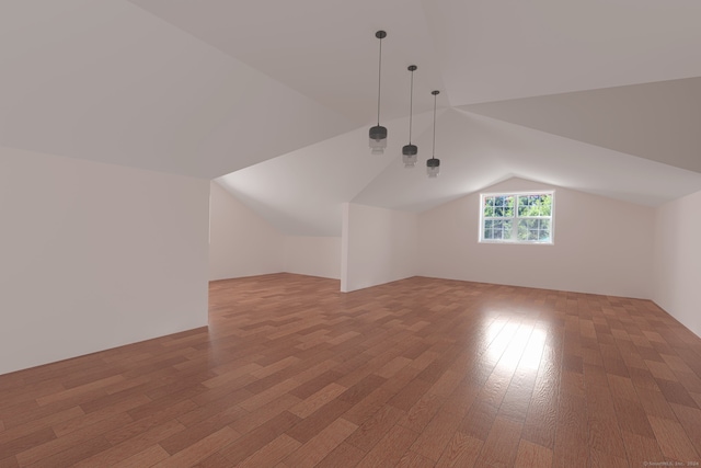 bonus room featuring lofted ceiling and wood-type flooring