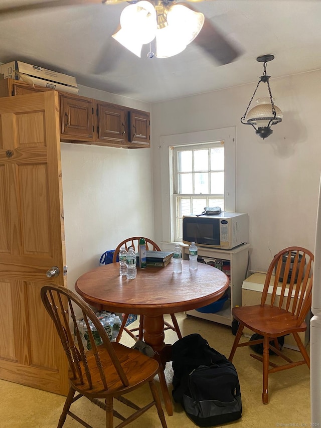 dining area featuring ceiling fan