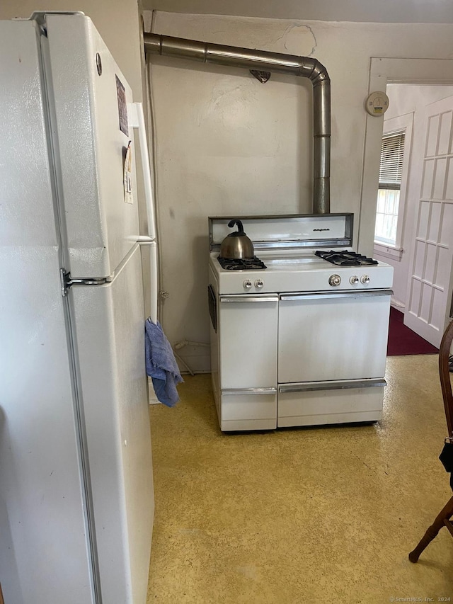 interior space featuring white appliances