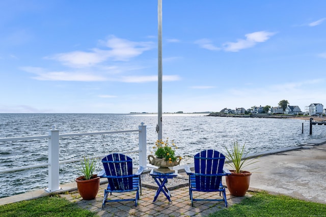 exterior space with a water view