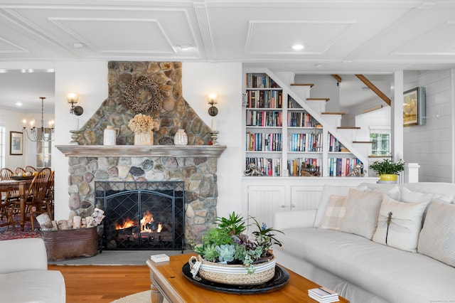 living room with a fireplace and hardwood / wood-style floors