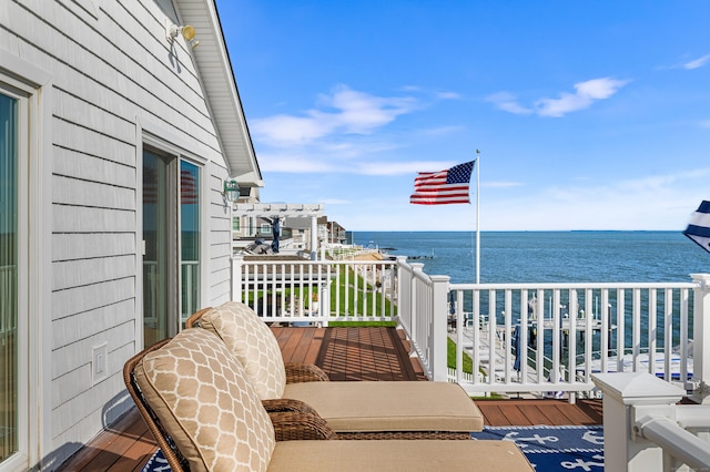 balcony featuring a water view