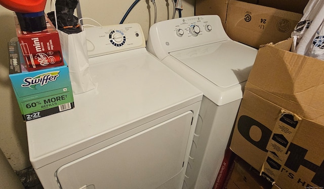 laundry area featuring washing machine and dryer