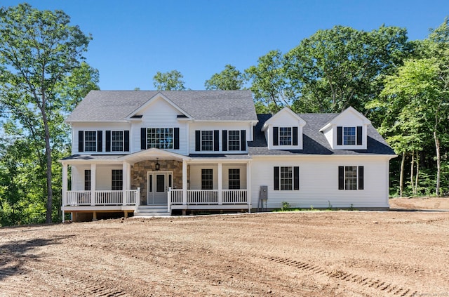 289 Young St, East Hampton, CT 06424 - view of front of property featuring a porch, stone siding, and a shingled roof