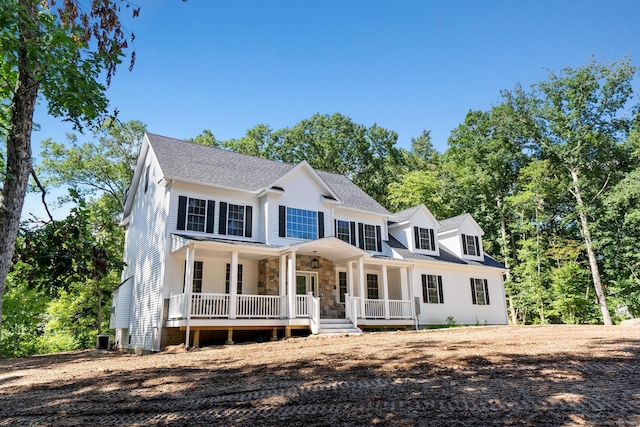 289 Young St, East Hampton, CT 06424 - colonial inspired home featuring cooling unit, covered porch, and a shingled roof