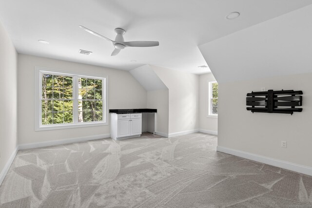 289 Young St, East Hampton, CT 06424 - additional living space featuring visible vents, baseboards, ceiling fan, light colored carpet, and lofted ceiling