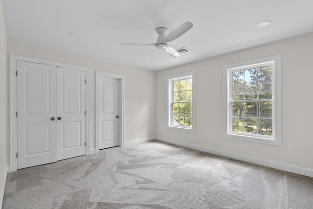 289 Young St, East Hampton, CT 06424 - unfurnished bedroom featuring visible vents, ceiling fan, baseboards, and carpet floors