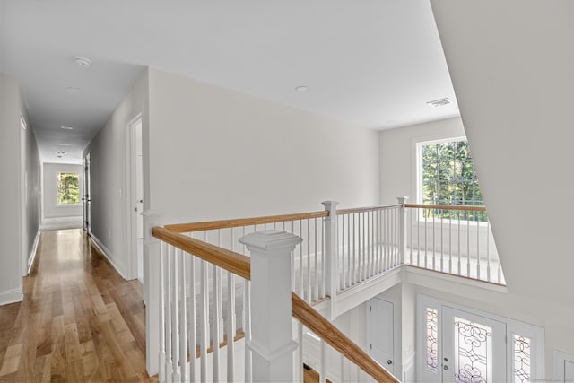 289 Young St, East Hampton, CT 06424 - hall with an upstairs landing, plenty of natural light, visible vents, and wood finished floors
