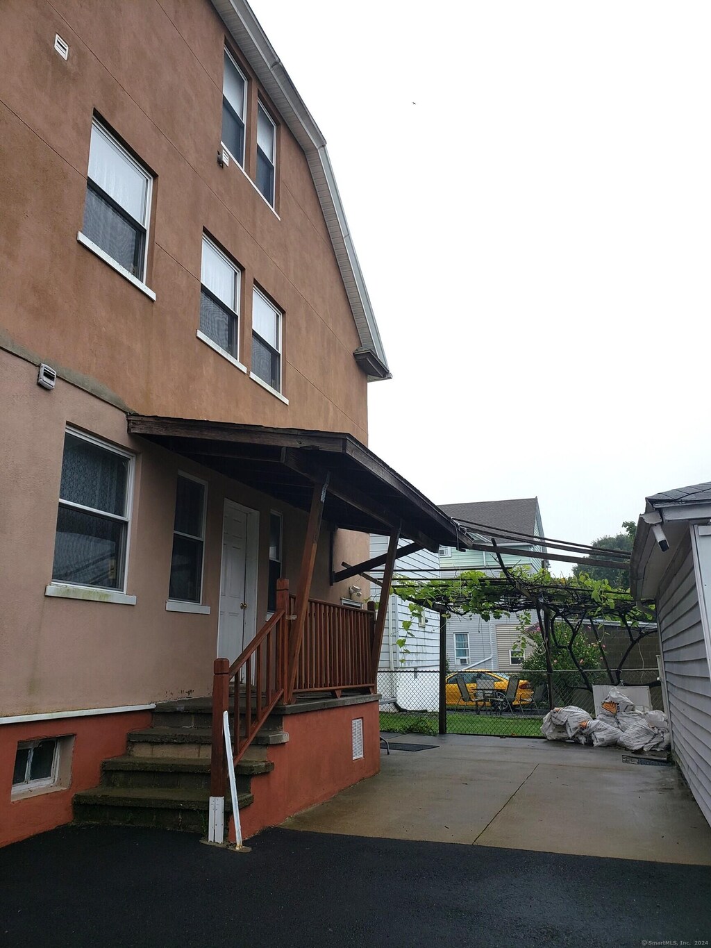 exterior space featuring a carport