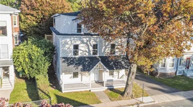 view of front of property featuring covered porch