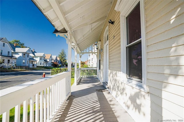 balcony featuring a porch