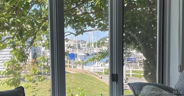 doorway featuring a water view