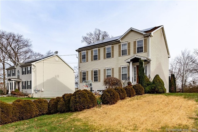 colonial house with a front yard