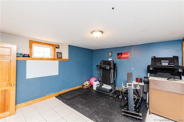 exercise area with light tile patterned floors