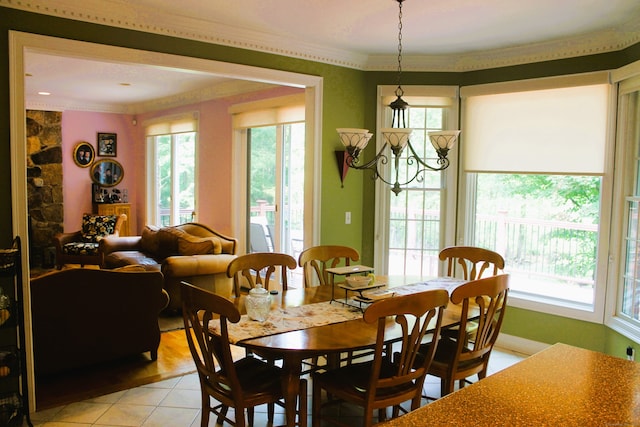 tiled dining space with crown molding