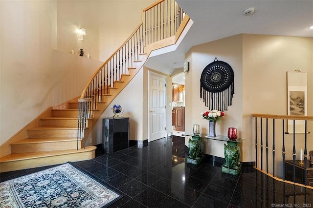 entrance foyer with a high ceiling