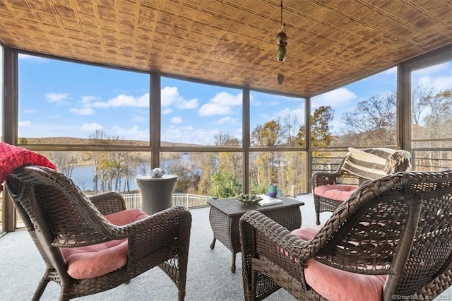 sunroom with a water view