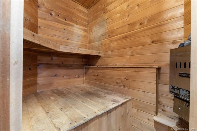 view of sauna / steam room with wooden walls