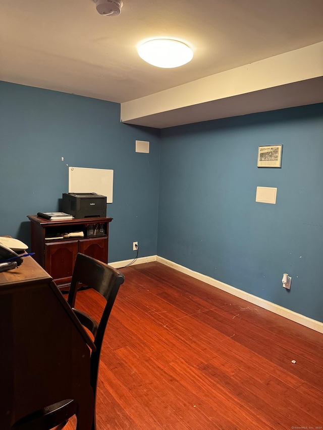 home office featuring dark wood-type flooring