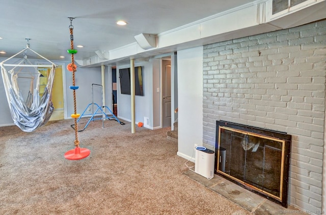 interior space featuring carpet flooring and a fireplace