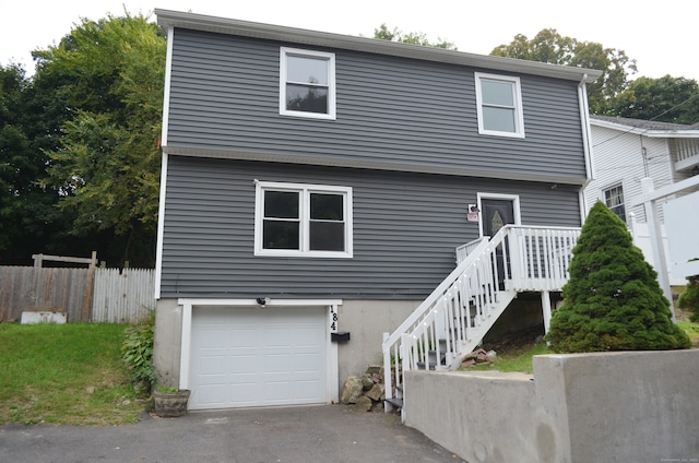 view of front of property featuring a garage