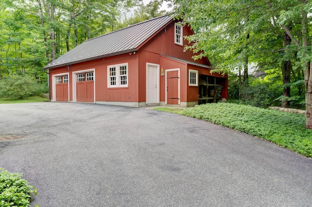 view of outbuilding with a garage