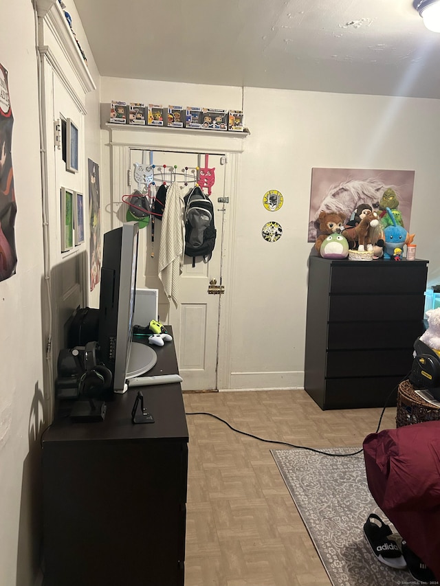 bedroom featuring light parquet floors