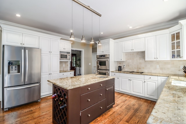 kitchen with dark hardwood / wood-style floors, stainless steel appliances, decorative backsplash, and white cabinets