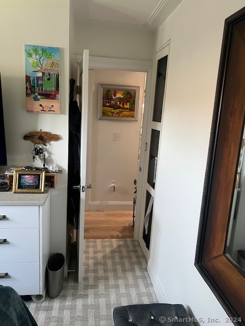 hall featuring light hardwood / wood-style flooring