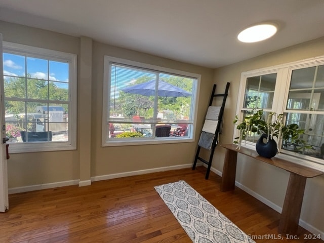 interior space with hardwood / wood-style floors