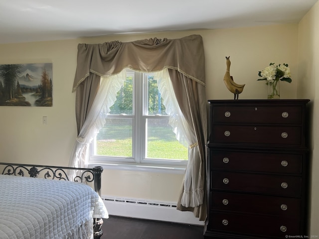 bedroom featuring baseboard heating