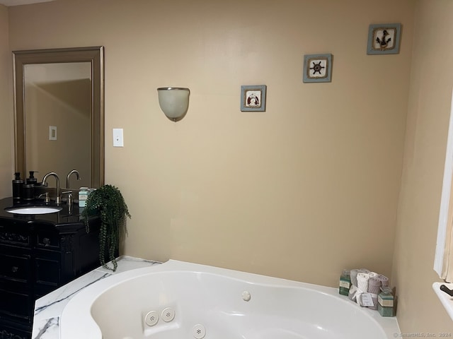 bathroom featuring a tub and vanity