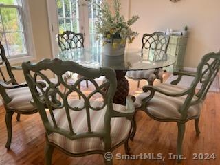 dining room with hardwood / wood-style flooring