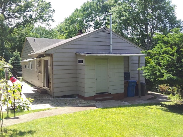 view of outbuilding featuring entry steps