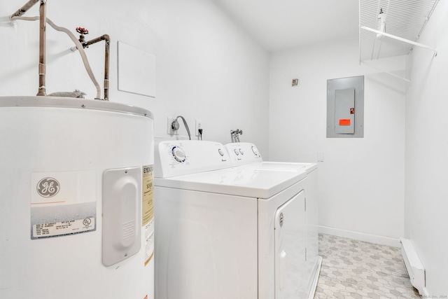 laundry area featuring light tile patterned flooring, electric panel, electric water heater, and washer and dryer